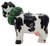 Novelty Christmas candle of a Holstein cow wearing a wreath around neck. The cow is standing and looking to her side. The single wick candle is by Boston Warehouse Trading Corp and was made in China.
