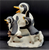 Whoa! figurine features a penguin inside a snowball with 2 penguins beside him. The figurine is a hand painted porcelain figurine crafted in Malaysia. Michelle Emblem's figurine is 6-inches wide by 6-inches tall and 5-inches deep.