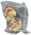 The Garfield Movie 8-inch tall Odie plush from 2024. The plush was exclusive to AMC theaters. Odie is a yellow Beagle-inspired dog that has brown ears and a soft body.