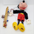 Vintage Pelham Puppets Walt Disney's Mickey Mouse hand made standard puppet for children. The Mickey Mouse marionette has a molded composition head with wooden limbs and a cross-shaped wooden control bar with strings. Pelham Puppets were Made in England.