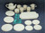 Tootsie Toy Hearts Home plastic tea set featuring garden themed scenes. The set includes serving tray, 4 tea cups, tea pot, sugar holder, creamer, 4 plates, 4 cup plates, 3 forks, 3 spoons and 1 fork.