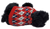 CHOSUN International black Scottish Terrier plush dog wearing a red, white and black argyle sweater. The terrier stands 10-inches tall and is 14-inches long and 6-inches wide. The plush has a realistic look and feel