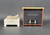Fisher-Price doll house decorator set #254 Chair and Fireplace.  The chair and fireplace set includes a plastic fireplace and FPT5022 white plastic square chair with tan stuffed fabric cushion that fits the chair with muli-colored flowers.