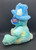 Hershey's Chocolate World Jolly Rancher blue tie-dye pattern teddy bear that is 10-inches tall. The bear is wearing a blue hat with Jolly Rancher on the front and his left foot has Jolly Rancher embroidered on it. The Hershey Company acquired the brand in 1996.