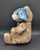 Hersheypark 1994 Hershey's 8-inch tall brown teddy bear wearing a houndstooth bow tie. The bear has Hershey embroidered in gold on left foot. This soft teddy bear was made by The Petting Zoo for ages 3 & up and was Made in China.