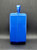 Hershey's Chocolate World souvenir plastic mini lunchbox by Whirley Industries. The case is blue with picture of the Hershey's Chocolate bar, Reese's Peanut Butter Cups and Hershey's Kiss riding the Chocolate World ride. The case is 5.5-inches wide x 7.25-inches tall x 3-inches high and Made in United States.