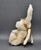Moondust Goodspeed bunny rabbit hare ornament #5624-08 by Boyds Bears. The plush ornament is posable and was introduced in 1999 and now retired. Moondust Goodspeed is 5 1/2-inches tall and is wearing gold ribbon on head and gold buttons on chest.