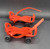 Mattel 1960's Baby First Step Dolls plastic red roller skates that slid over the feet of the doll. The skates are 4-inches long and a 3 3/4-inch inner footbed. The skates featured grooved bottoms to help stabilize her as she moved