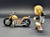 Funko Mystery Minis The Walking Dead series 4 Daryl Dixon with Knife & Crossbow with Daryl's bike brown variation for 2016. The Daryl Dixon is 1/24 figure. Daryl Dixon is a fictional character from AMC's horror drama series The Walking Dead portrayed by actor Norman Reedus. He appears as a major character in The Walking Dead and as the titular character of its spin-off series The Walking Dead: Daryl Dixon.