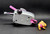 PAW Patrol vehicle of Skye's Helicopter with Skye by Spin Master for ages 3+. Skye's helicopter is grey with pink rotor and trim. Skye is wearing pink uniform and ready for action. Skye is a seven-year-old cockapoo and the first female member of the PAW Patrol. Her main color is pink. As the team's air rescue pup, her main jobs are flying and locating things, often seen with her helicopter's grappling hook and harness, helping people and transporting other team members.