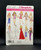 Simplicity 4702 11 1/2" doll clothes patterns by Andrea Schewe. The set offers 34 pieces to complete 13 different looks for your 11 1/2" dolls.