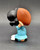 Peanuts Gang 2.25-inch tall mini figure of Lucy Van Pelt holding a football. The mini figures were sold in surprise eggs. Lucille "Lucy" Van Pelt is a fictional character in the syndicated comic strip Peanuts, written and drawn by Charles Schulz. She is the older sister of Linus and Rerun.