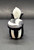 Disney's Flower the Skunk holding flowers 2.25-inch tall PVC figure for ages 3+. Flower is a major character in Disney's 1942 animated feature film Bambi. He is a bashful, soft-spoken skunk who is mistakenly identified as a "flower" by Bambi, hence his ironic name. The figure was Made in China.