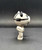 Roblox Piggy blind bag Robby from series 1. This is a 3-inch collectible figure featuring a grey, robot-like pig character with a chainsaw arm and mismatched eyes. The figure is often sold in mystery packs or specialized 4-packs.