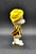 Vintage 1969 Pogo Possum soft vinyl figure created by Walt Kelly. The 4-inch figure was Made in Japan. Pogo was a daily comic strip that was created by cartoonist Walt Kelly and syndicated to American newspapers from 1948 until 1975. Pogo is wearing a orange and black vertical striped shirt with a yellow hat.