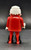 Geobra the German manufacture of Playmobil 1986 Santa Claus 3-inch tall figure for ages 3+. The figure is wearing a red Santa suit and black boots and belt. Santa is missing his hat and accessories.
