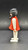 Geobra the German manufacture of Playmobil 1974 female Indian 3-inch tall figure for ages 4+. The figure is wearing a red top and white shirt and pants. The figure is missing headpiece.