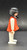 Geobra the German manufacture of Playmobil 1974 female Indian 3-inch tall figure for ages 4+. The figure is wearing a red top and white shirt and pants. The figure is missing headpiece.