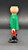 Playmobil GEOBRA PLAYMOBIL 2002 3174 Red Pirateship Pirate 3" Figure (Part #30007040), side view of a vintage pirate figure wearing a green coat, red trousers, and black boots.