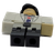 This is the Dr. Bright action figure from the Jazwares Roblox Series 10 collection, inspired by the SCP-themed game Site 76. Depicts Dr. Jack Bright from the SCP Foundation universe as adapted into the Roblox platform. Wears a white lab coat over a dark tie and sports the distinct red SCP-963 amulet around his neck. Originally released in Series 10 mystery boxes alongside an exclusive virtual item redemption code.