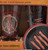 Bacon Crispy, Salty & Delicious set of 4 pint glasses by Aquarius in 2012. The glasses consists of 4 different designs with bacon in the shape of a water drop with "Liquid Bacon" under the picture. Another glass has a pig with "In Bacon We Trust" and glass has a peace sign with bacon and " Make Bacon, Not War". The final glass has bacon in pan with "Powered by Bacon". The glasses are thick glass and hand wash only.
