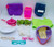 Collection of accessories including glasses, sunglasses, bags, hats, socks, mittens and top. The accessories are for 18-inch dolls and made of plastic and fabric.