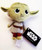 Funko Star Wars Yoda Plush, a soft stuffed toy featuring Yoda from Star Wars with large, expressive eyes and dressed in traditional robes.