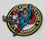 Funko DC Comics Legion of Collectors Superman exclusive patch.  The patch features Superman flying through the air with It's a bird, it's a plane, it's Superman written on the black ring around the patch.