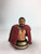 NECA 300 King Leonidas Resin Mini-Bust, detailed collectible bust of King Leonidas from the movie 300 with a red cape, muscular chest, and intense facial expression.