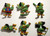 MLB 1989 MLB Pittsburgh Pirates Mascot: Buccaneer the Pirate Parrot Toy Figures Set, collectible toy figures of pirate parrots dressed in various costumes including superhero, baseball player, and conductor, representing the Pirates mascot.
