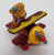 Disney Tailspin - Molly Cunningham Die-cast Plane, a vintage toy with a figurine of Molly Cunningham sitting in a red and yellow airplane with gray propeller.
