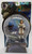 Product POPCo The Golden Compass: Lyra Belacqua with Pantalaimon Ermine & Wildcat Daemon Forms Action Figure, a collectible figure of Lyra Belacqua from the series with her daemons, Pantalaimon in Ermine and Wildcat forms, in original packaging.