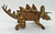 Hasbro Jurassic World Bashers & Biters Stegosaurus Figure, toy dinosaur with textured brown body, plates on back, and tail spikes.