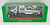 HESS 2001 Miniature Hess Racer Transport, collectible toy set featuring a white Hess gasoline tanker truck carrying a miniature white race car in transparent display box.