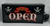 Pirate Themed Bar Open Novelty Light, black rectangular sign with skull and crossed swords design and the words 'Bar Open' in bold red and yellow lettering.