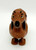 Vintage Dachshund Ramp Walker, a charming wooden collectible figurine of a dachshund dog with painted facial features and floppy ears.