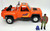 Kenner M.A.S.K. Hondo 'Striker' MacLean With Firecracker toy vehicle, featuring an orange off-road truck with decal details, alongside a miniature figure and additional accessories.