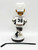 SGA AHL Hershey Bears Dane Byers Bobblehead, hockey player figurine wearing a white jersey with black and brown details and the number 38, holding a hockey stick, and wearing a white helmet.