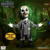 Beetlejuice Mega-Scale 15-Inch Talking Doll, large collectible doll featuring Beetlejuice character with green hair, striped suit, and animated expression, in a spooky forest setting.