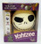 Product USAopoly Yahtzee: Tim Burton's The Nightmare Before Christmas Jack Skellington with a skull-shaped dice cup in a boxed set.