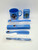 Disney's Snow White Childs Bathroom Set, blue bathroom accessories featuring Snow White and the Seven Dwarfs, including a mug, soap case, toothbrush, toothbrush case, hair comb, and toothbrush in packaging.