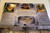 Universal Monsters Universal Studios Monsters Collection Action Figures, featuring Frankenstein, Wolf Man, and Mummy, with collectible monster stamps and themed packaging.