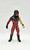 WWE 1999 Kane Action Figure (Loose), professional wrestling character toy with detailed red and black costume, muscular build, and long black hair, standing against a plain white background.