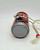 Coca-Cola Stash Can, small miniature replica of a Coca-Cola soda can with a string and red plastic piece attached for hanging.