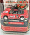 Coca-Cola Matchbox Collectibles Coca-Cola Play Refreshed Collection - 1994 Ford Mustang Cobra, diecast model car in red with Coca-Cola and Play Refreshed branding, packaged in a display case.