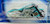 Hot Wheels 2004 Roll Patrol - Scorchin Scooter Motorcycle, toy motorcycle in turquoise with silver engine and black accents in packaging