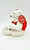 Coca-Cola 2000 Coca-Cola Female Polar Bear 5" Stuffed Animal, plush white polar bear wearing a red and white outfit with a tag that says 'Exclusive 2000 Design'.