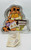 Wilton Garfield Cake Pan, metal cake pan with Garfield cartoon design for baking birthday cakes.