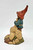 Cairn Studio, LTD Tom Clark Gnomes - Johann (No Box), collectible gnome figurine with tall red hat, brown beard, green coat, surrounded by rocks and seashells.