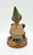 Cairn Studio, LTD Tom Clark Gnomes - Friday (No Box), decorative gnome figurine with a tall green hat, beige coat, sitting on a autumn leaves decorated base.